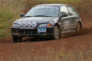 Matt Himes / Silas Himes come out of a sweeper on the practice stage in their Honda Civic.
