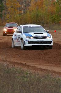 Tim Rooney / Travis Hanson launch their Subaru WRX Sti off the line at the practice stage.