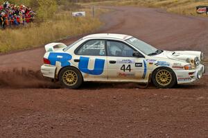Henry Krolikowski / Cindy Krolikowski drift their Subaru Impreza through the spectator corner on Green Acres, SS1. (2)