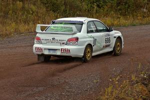 Heath Nunnemacher / Mike Rossey drift out of the spectator corner on Green Acres, SS1, in their Subaru WRX STi.