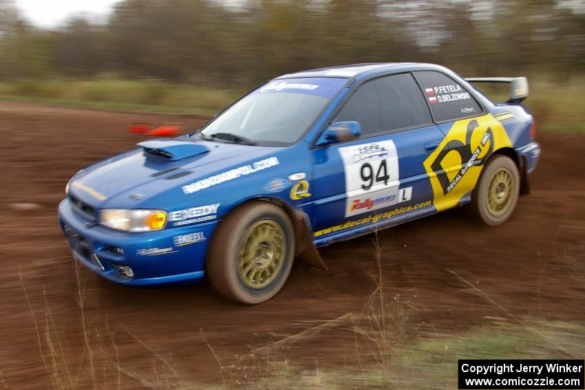 The Piotr Fetela / Dariusz Belzowski Subaru Impreza on the practice stage.