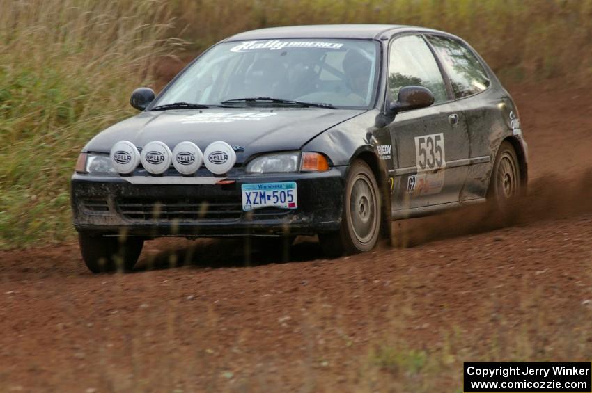 Matt Himes / Silas Himes come out of a sweeper on the practice stage in their Honda Civic.