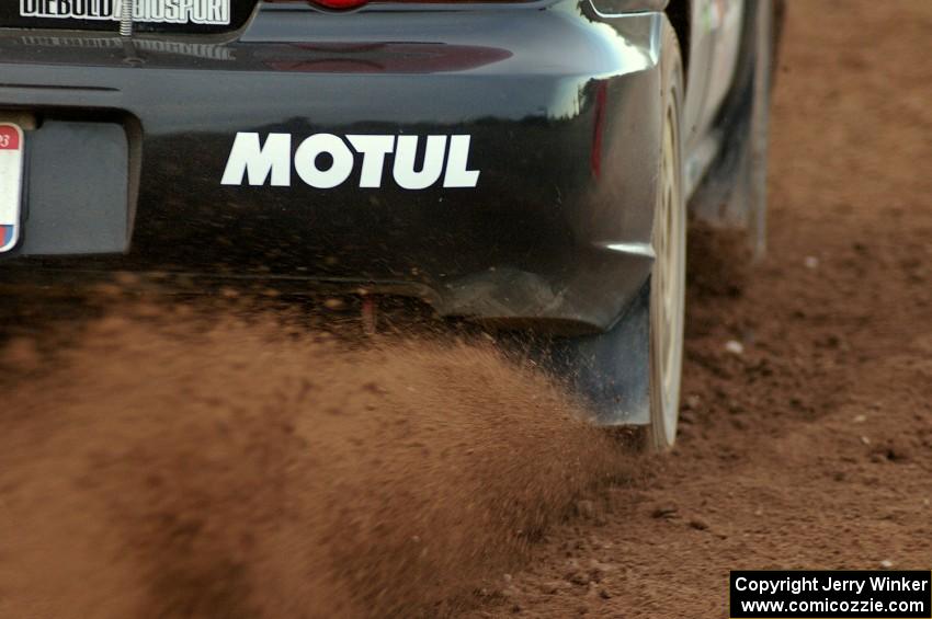 Pat Moro / Ole Holter accelerate hard at the start of the practice stage in their Subaru WRX STi.