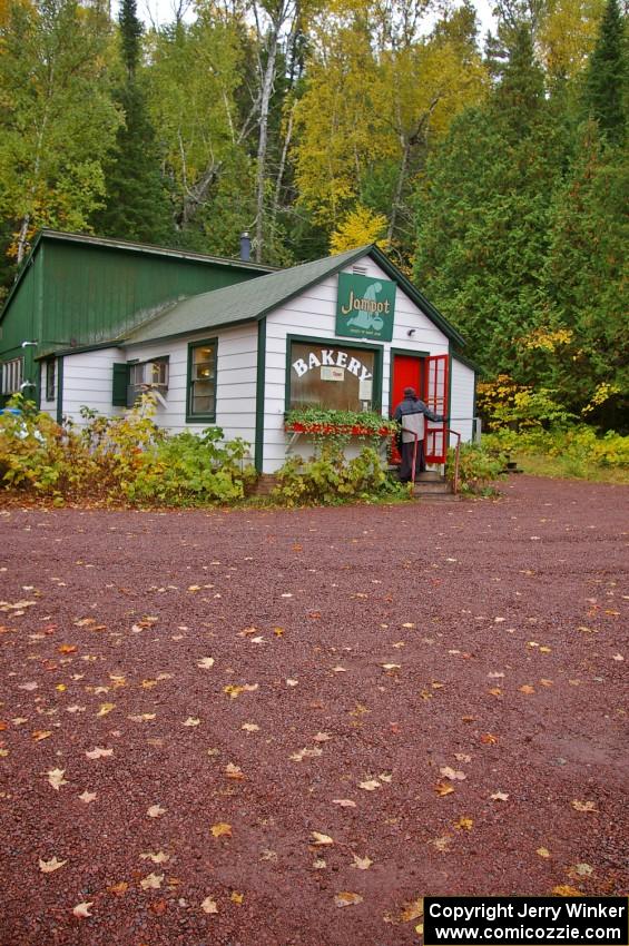 A monk heads into work at the Jampot Bakery near Eagle River.