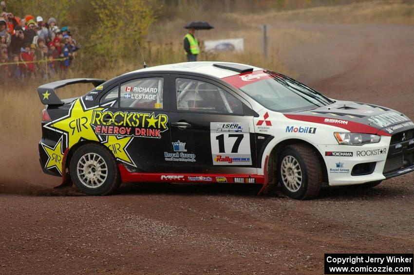 Antoine L'Estage / Nathalie Richard drift hard at the spectator corner on Green Acres, SS1, in their Mitsubishi Lancer Evo X.