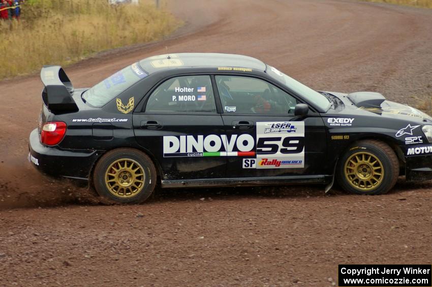 Pat Moro / Ole Holter power out of the spectator corner on Green Acres, SS1, in their Subaru WRX STi.