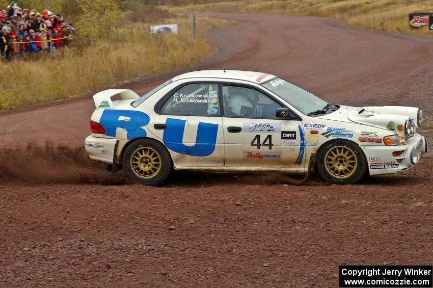 Henry Krolikowski / Cindy Krolikowski drift their Subaru Impreza through the spectator corner on Green Acres, SS1. (2)