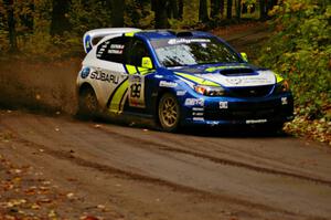 Travis Pastrana / Christian Edstrom drift through one of the final corners of Beacon Hill, SS2, in their Subaru WRX STi.