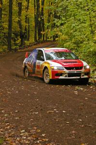 Arkadiusz Gruszka / Lukasz Wronski drift through a sweeper near the finish of Beacon Hill, SS2, in their Mitsubishi Lancer Evo 9