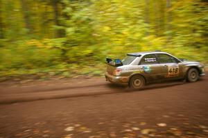 Jimmy Keeney / Missy Keeney hang the tail out on a fast sweeper near the finish of Beacon Hill, SS2, in their Subaru WRX STi.