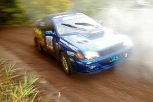 The Piotr Fetela / Dariusz Belzowski Subaru Impreza at speed near the finish of SS2, Beacon Hill.