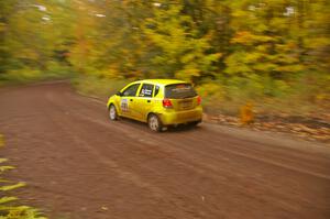 Jim Stevens / Marianne Stevens come into the flying finish of Beacon Hill, SS2, in their Suzuki Swift.