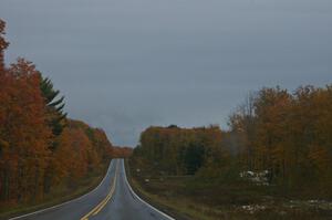 Clouds grew dark and rain continued near stage 3, Camp 18.