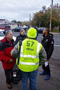 Dave Weiman, Karen Wagner, Bill Wood and Alex Kihurani converse at Kenton service.