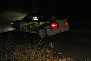 Janusz Topor / Michal Kaminski at speed on Far Point 1, SS5, in their Subaru WRX STi.