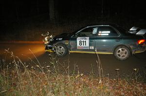 Jaroslaw Sozanski / Bartosz Sawicki at speed on Far Point 1, SS5, in their Subaru Impreza RS.