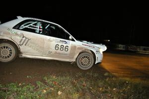 Heath Nunnemacher / Mike Rossey drift their Subaru WRX STi through the spectator corner on Far Point 2, SS7.