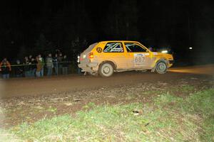 Chad Eixenberger / Chris Gordon set their VW Golf up for the corner in front of the horde of spectators on Far Point 2, SS7.