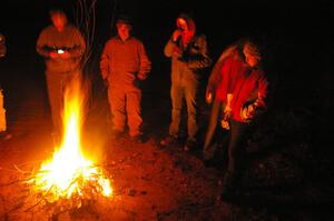 Marshalls at a campfire before the start of SS9, Menge Creek.