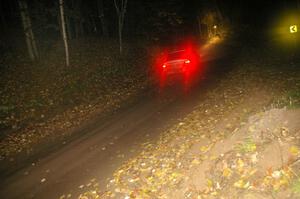 Arkadiusz Gruszka / Lukasz Wronski head downhill into a fast sweeper on Menge Creek, SS9, in their Mitsubishi Lancer Evo 9.