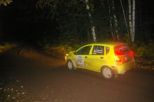 Jim Stevens / Marianne Stevens head downhill at speed on Menge Creek, SS9, in their Suzuki Swift.