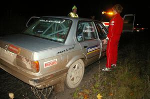 The Bill Caswell / Elliott Sherwood BMW 318i stopped at the end of Menge Creek, SS9, after having a small fire.