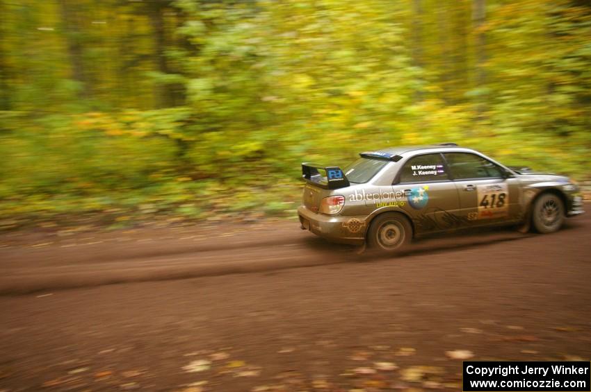 Jimmy Keeney / Missy Keeney hang the tail out on a fast sweeper near the finish of Beacon Hill, SS2, in their Subaru WRX STi.