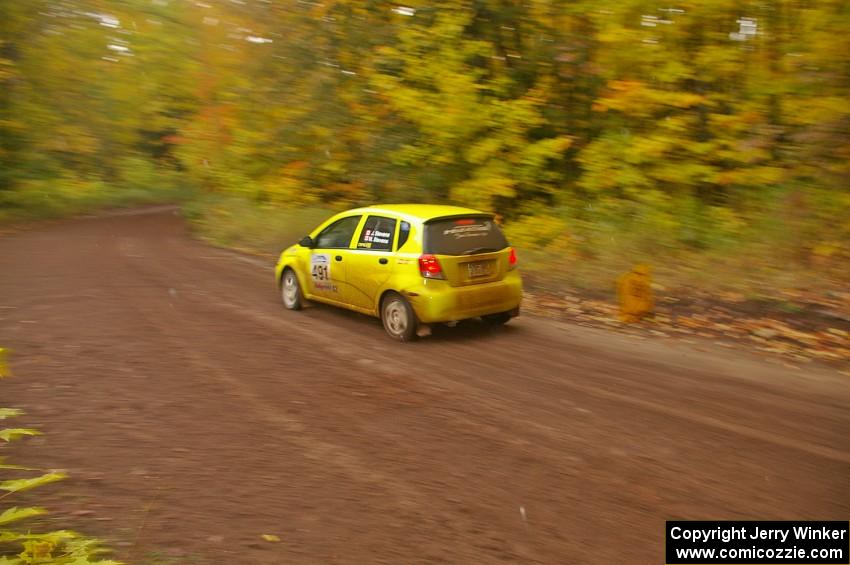 Jim Stevens / Marianne Stevens come into the flying finish of Beacon Hill, SS2, in their Suzuki Swift.