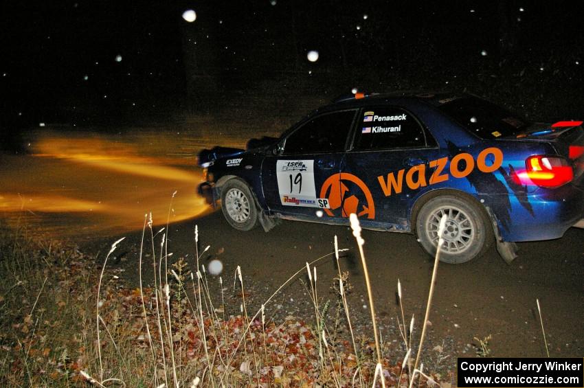 Tim Penasack / Alex Kihurani at speed on Far Point 1, SS5, in their Subaru WRX.