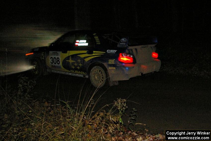 Janusz Topor / Michal Kaminski at speed on Far Point 1, SS5, in their Subaru WRX STi.