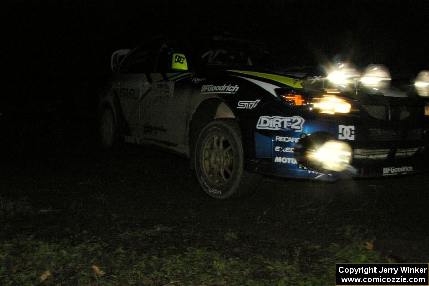 Travis Pastrana / Christian Edstrom slide heavily at the spectator point on Far Point 2, SS7, in their Subaru WRX STi.