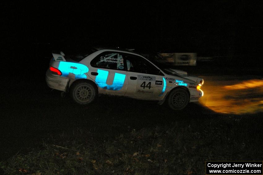 Henry Krolikowski / Cindy Krolikowski drift their Subaru Impreza through a 90-right on SS7, Far Point 2.