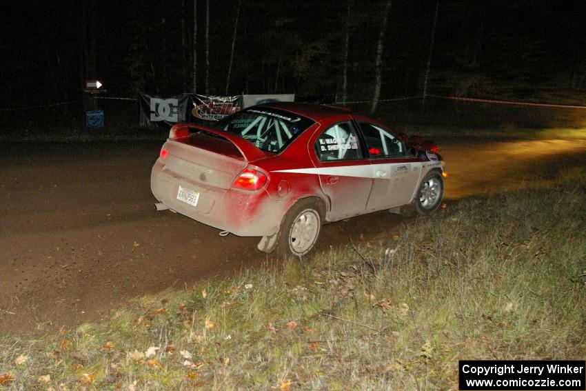 Doug Shepherd / Karen Wagner drift their Dodge SRT-4 through the spectator corner on Far Point 2, SS7.