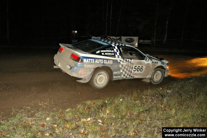 Matt Huuki / Tom Immonen drift their Eagle Talon through the spectator corner on Far Point 2, SS7.