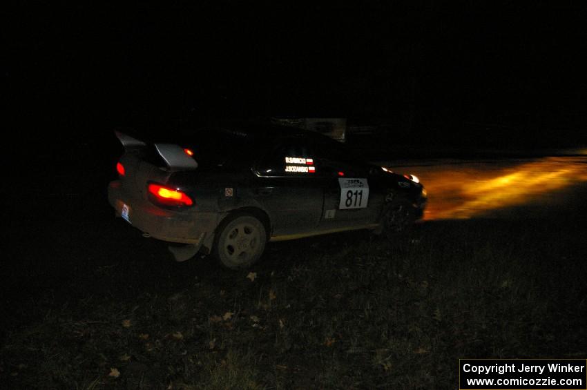 Jaroslaw Sozanski / Bartosz Sawicki power through the spectator corner on Far Point 2, SS7, in their Subaru Impreza RS.