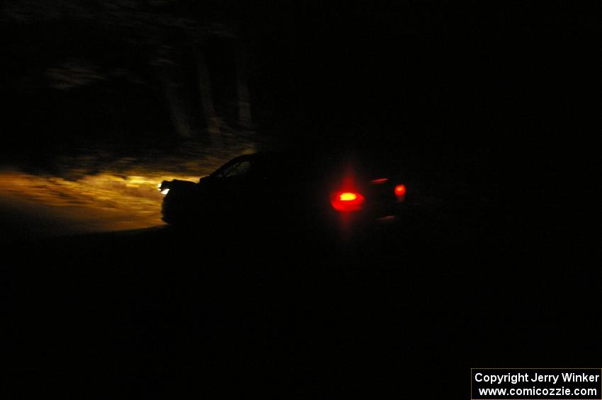 Heath Nunnemacher / Mike Rossey head downhill into the twisty section of Menge Creek, SS9, in their Subaru WRX STi.