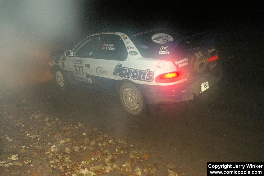 Mason Moyle / Scott Putnam head downhill in the twisty section of Menge Creek, SS9, in their Subaru Impreza.