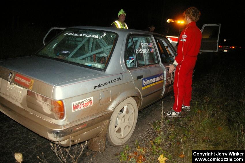 The Bill Caswell / Elliott Sherwood BMW 318i stopped at the end of Menge Creek, SS9, after having a small fire.