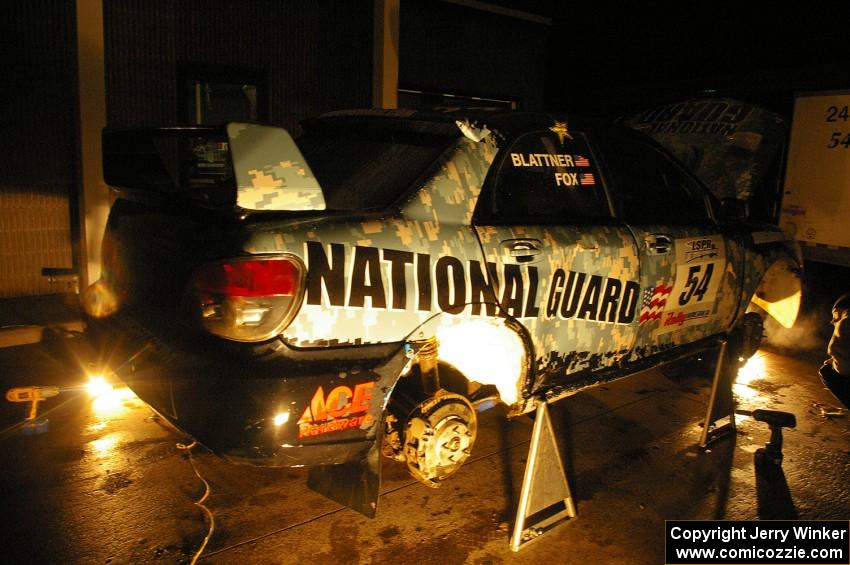 Mark Fox / Jake Blattner get repairs to their Subaru WRX STi under an awning of a closed gas station in Baraga at 2AM. (2)