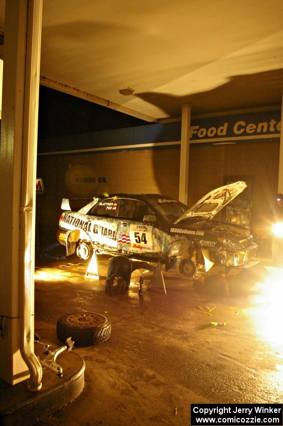Mark Fox / Jake Blattner get repairs to their Subaru WRX STi under an awning of a closed gas station in Baraga at 2AM. (3)