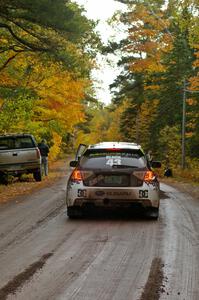 The Ken Block / Alex Gelsomino Subaru WRX STi pulls forward at the start of Delaware 1, SS11.