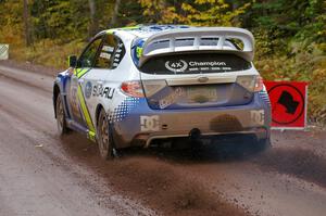 Travis Pastrana / Christian Edstrom blast away from the start of Delaware 1, SS11, in their Subaru WRX STi.