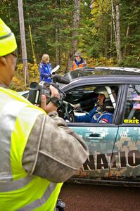 Mark Fox / Jake Blattner are interviewed in their Subaru WRX STi by Bill Wood at the start of Delaware 1, SS11.