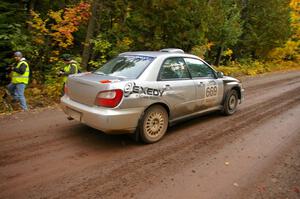 Evan Cline / Jason Grahn blast away from the start of Delaware 1, SS11, in their Subaru Impreza.