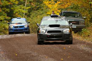 Vio Dobasu / Rob Amato blast away from the start of Delaware 1, SS11, in their Subaru WRX STi.