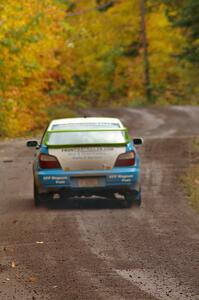 Pete Hascher / Scott Rhoades leave the start of Delaware 1, SS11, in their Subaru WRX.