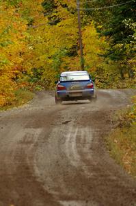 Janusz Topor / Michal Kaminski blasts uphill from the start of Delaware 1, SS11, in their Subaru WRX STi.