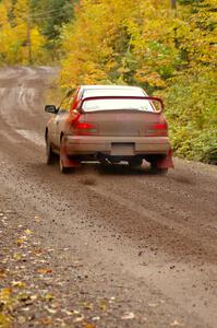 Dustin Kasten / Corina Soto shift their Subaru Impreza into second on the uphill start of Delaware 1, SS11.