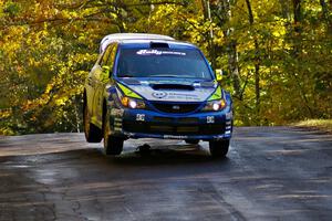 Travis Pastrana / Christian Edstrom catch a little air at the midpoint jump on Brockway Mtn. 1, SS13, in their Subaru WRX STi.