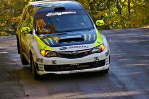 Ken Block / Alex Gelsomino make a landing at the midpoint jump on Brockway Mtn. 1, SS13, in their Subaru WRX STi.